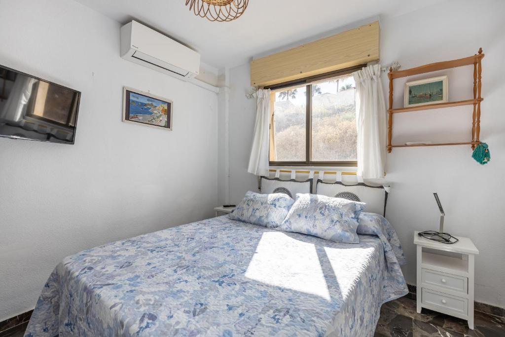 Posteľ alebo postele v izbe v ubytovaní atico primera linea de playa