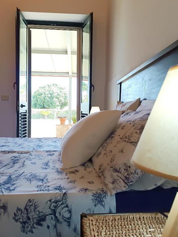 Postel nebo postele na pokoji v ubytování Casa Daniela