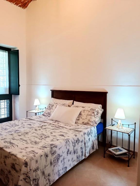 Postel nebo postele na pokoji v ubytování Casa Daniela