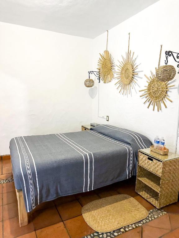 Postel nebo postele na pokoji v ubytování Posada El Palomar