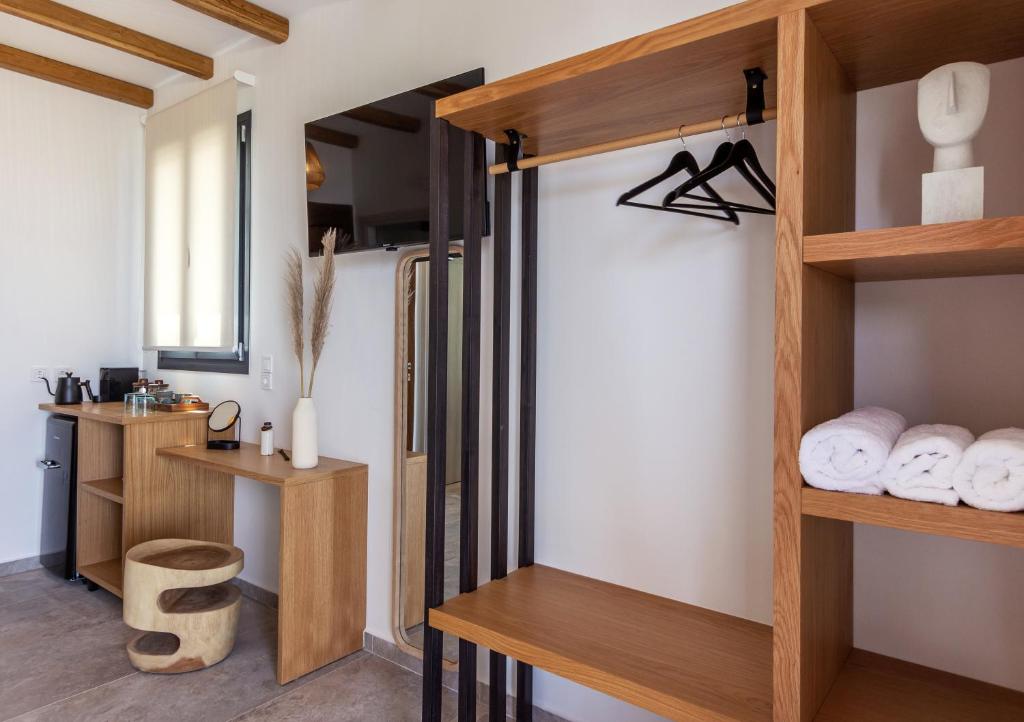 Kuchyň nebo kuchyňský kout v ubytování Obsidian Suites Milos