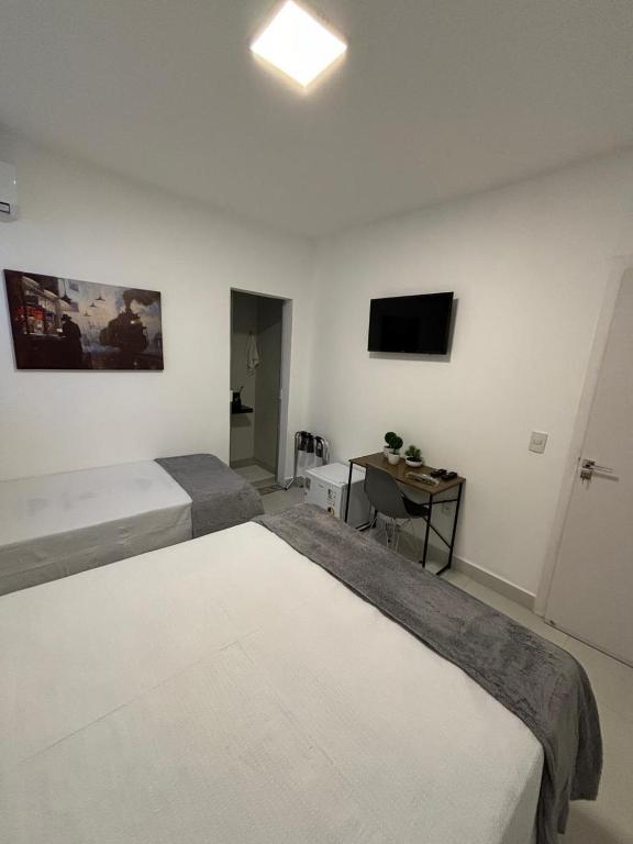 Postel nebo postele na pokoji v ubytování Torre Hotel