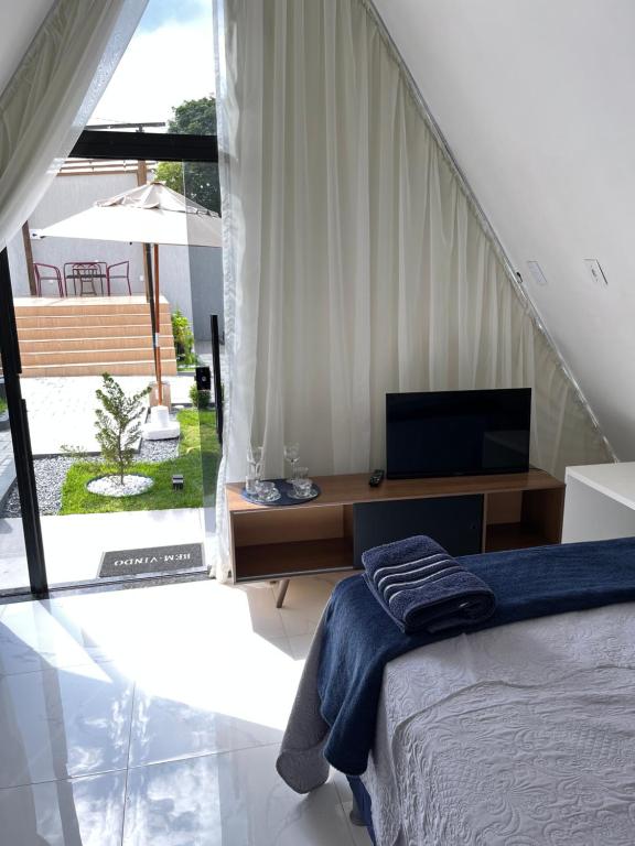 Postel nebo postele na pokoji v ubytování Villa Suíça Ibiapaba