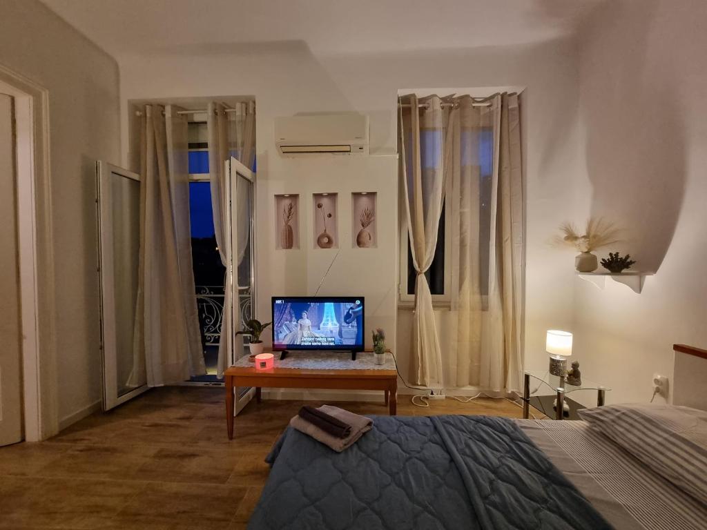 Televízia a/alebo spoločenská miestnosť v ubytovaní ***Apartment Magic &SummerVibes***
