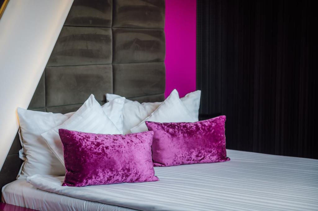 Postel nebo postele na pokoji v ubytování Plaza V Hotel