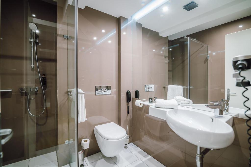 Koupelna v ubytování Plaza V Hotel
