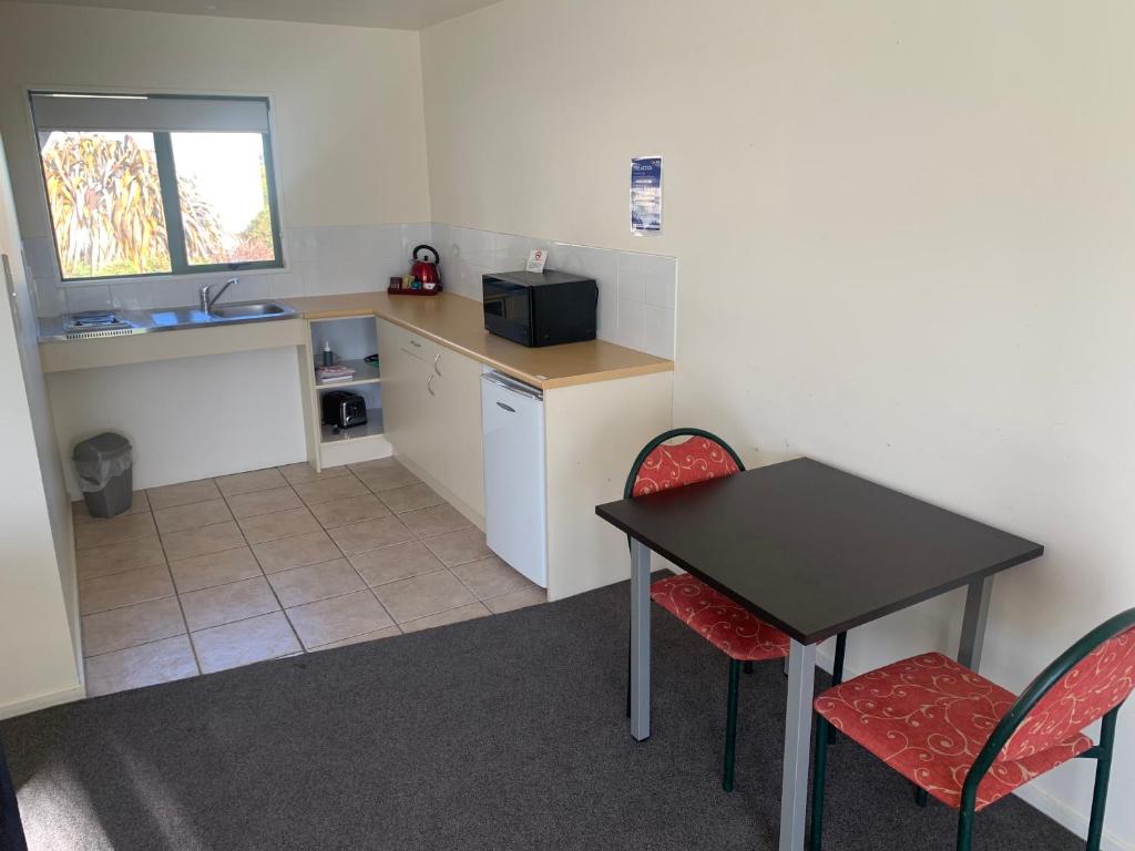 Kuchyň nebo kuchyňský kout v ubytování Cheviot Hotel