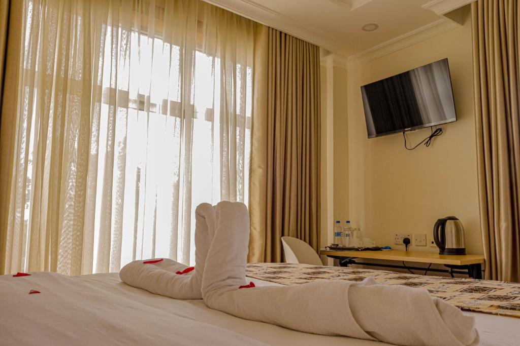 TV a/nebo společenská místnost v ubytování Pori City Hotel