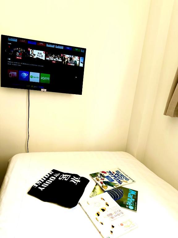 TV a/nebo společenská místnost v ubytování 木居 Woody House