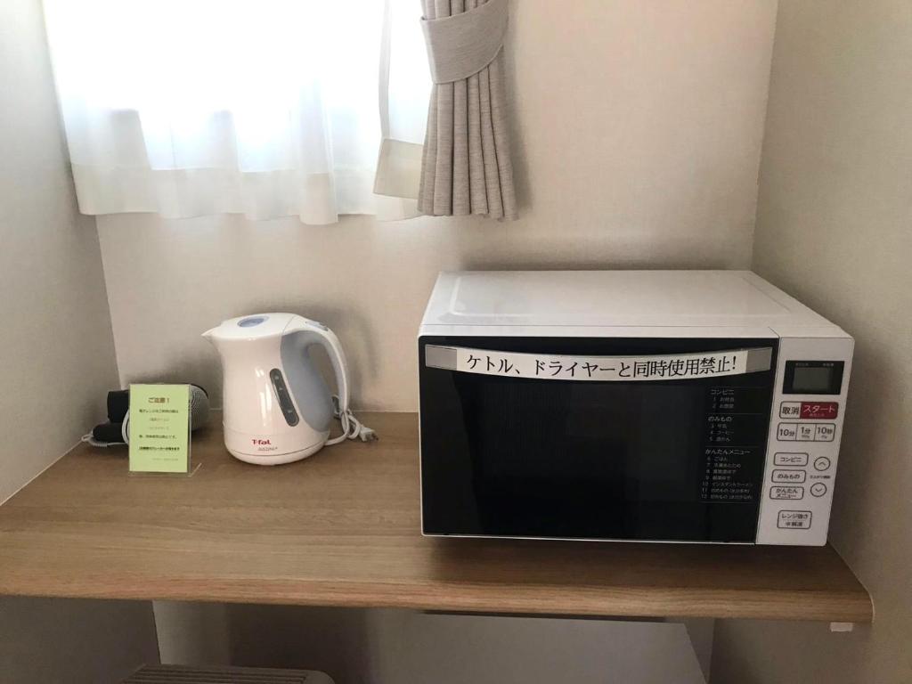 Kuchyň nebo kuchyňský kout v ubytování Family Stay Tsukuba Room