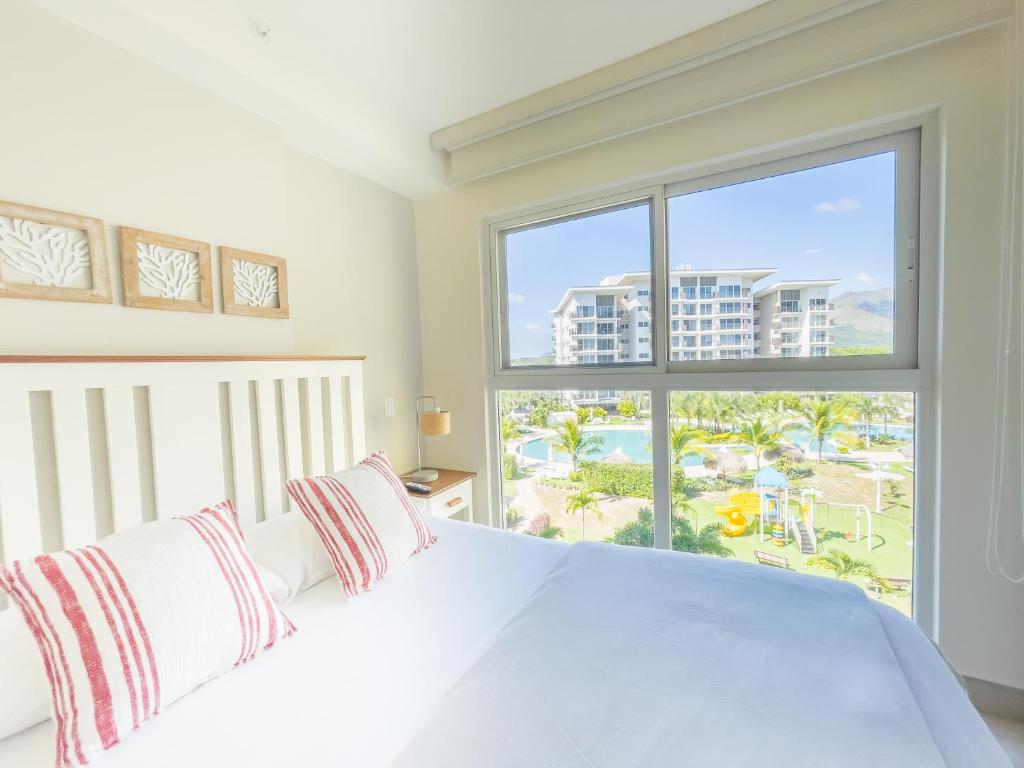 Postel nebo postele na pokoji v ubytování Ventanas del Mar by Playa Caracol 3 Habitaciones