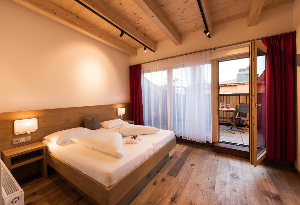 Postel nebo postele na pokoji v ubytování Appartements Hubenhof