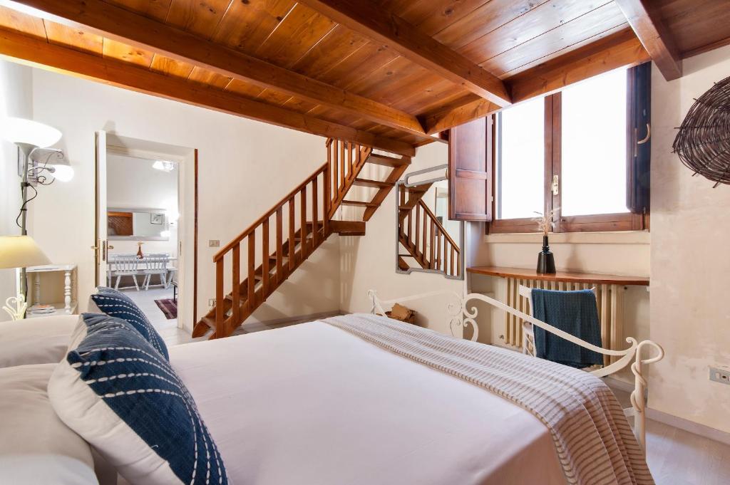 Postel nebo postele na pokoji v ubytování Casetta Rubichi Apartment