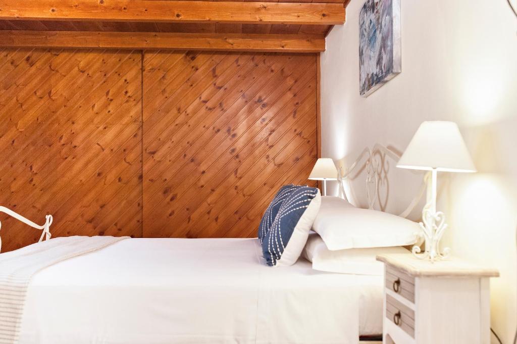 Postel nebo postele na pokoji v ubytování Casetta Rubichi Apartment