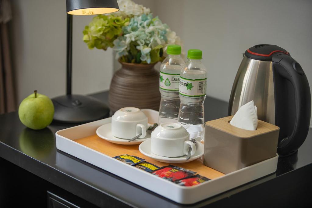Příslušenství pro přípravu čaje a kávy v ubytování Hanoi Starlight Boutique Hotel