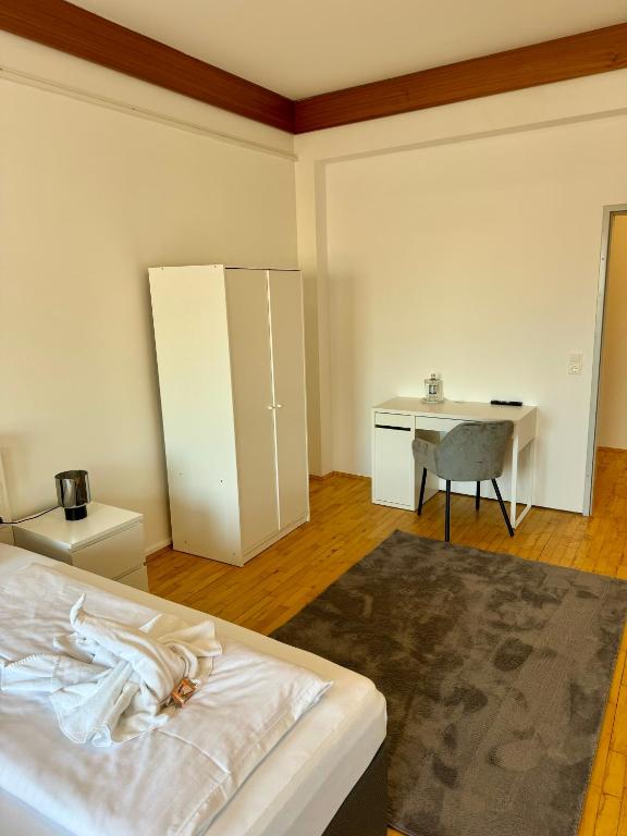 Postel nebo postele na pokoji v ubytování Stadthotel Schwerterbräu