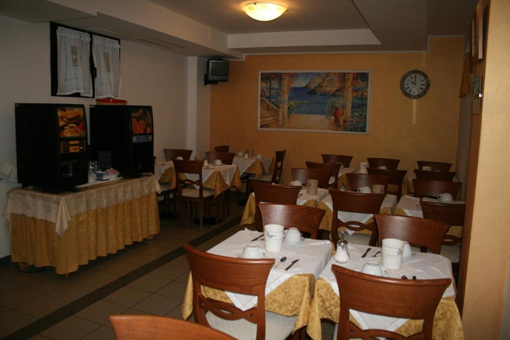 TV a/nebo společenská místnost v ubytování Hotel Rocco