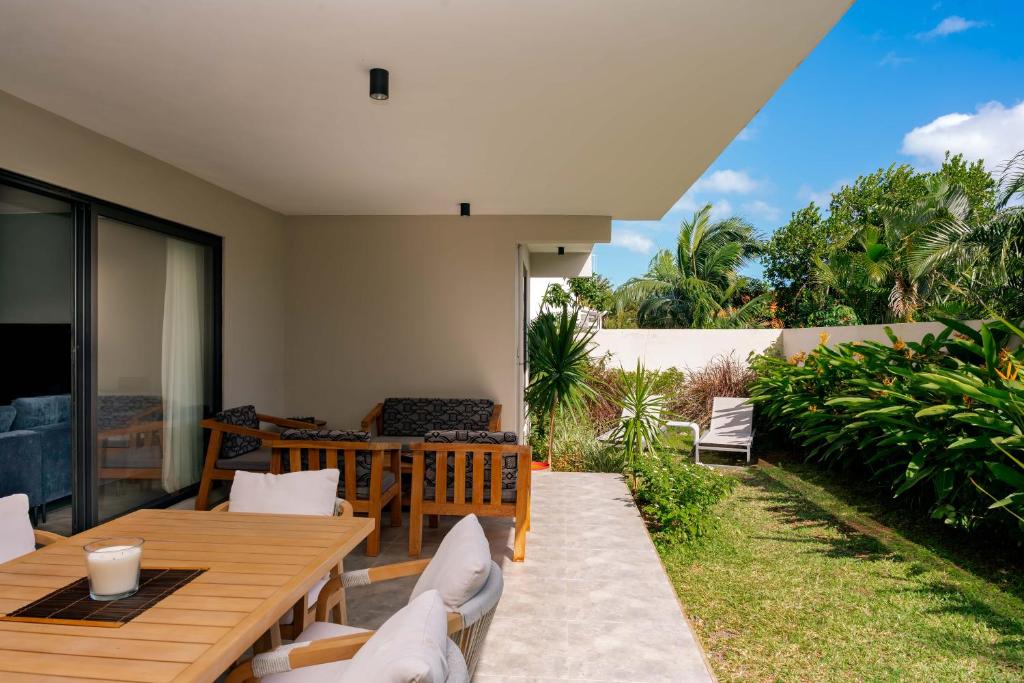 Сад в Appartement moderne de 3 chambres avec jardin près de la plage