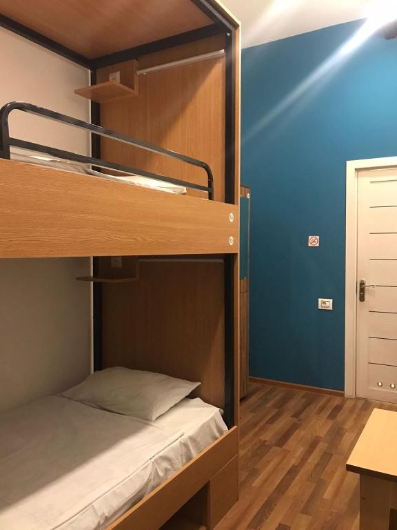 Postel nebo postele na pokoji v ubytování Central Hostel