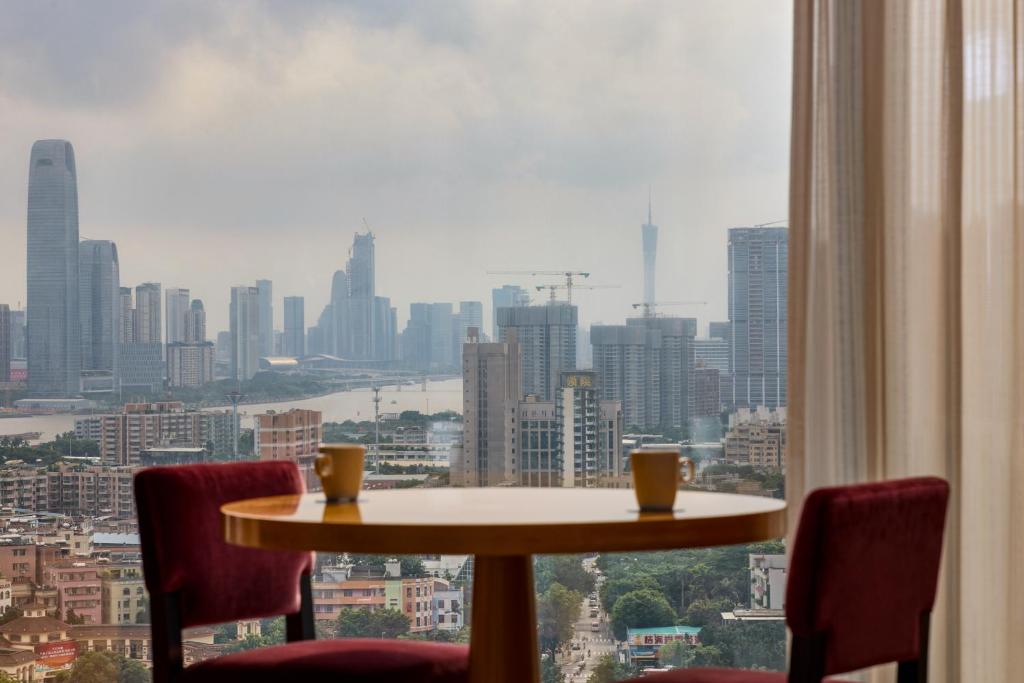 Nespecifikovaný výhled na destinaci Kanton nebo výhled na město při pohledu z hotelu