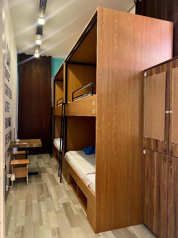 Postel nebo postele na pokoji v ubytování Central Hostel