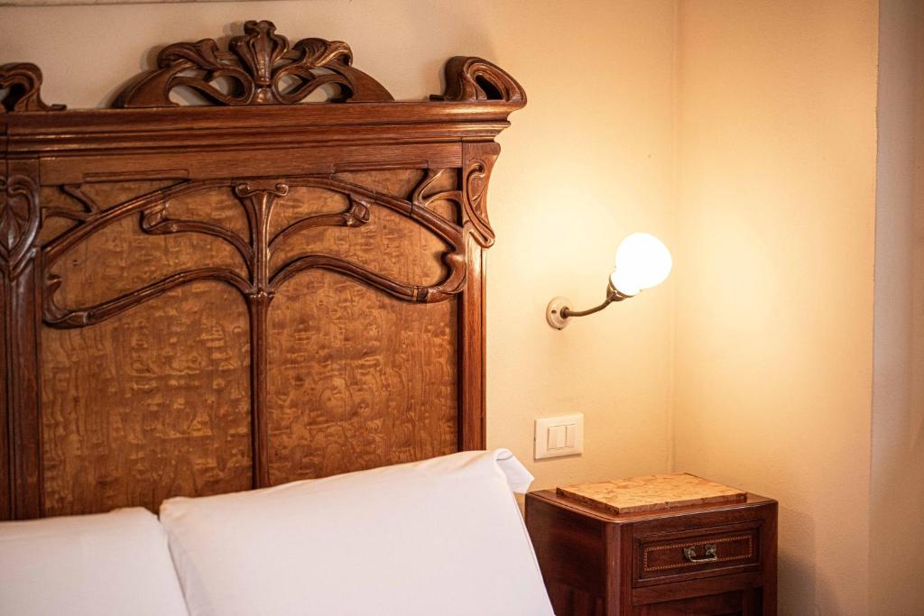 Postel nebo postele na pokoji v ubytování Agriturismo La Cerra