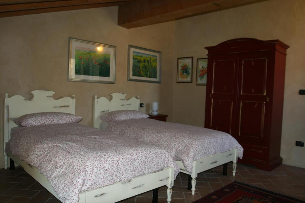 Posteľ alebo postele v izbe v ubytovaní SacreTerre B&B e Agriturismo