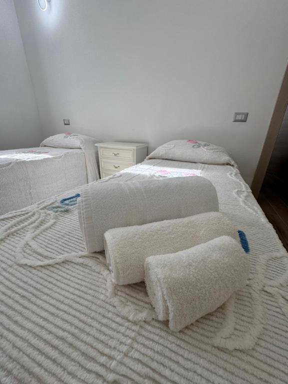 Postel nebo postele na pokoji v ubytování Il Pergolato