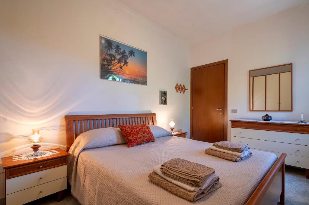 Ένα ή περισσότερα κρεβάτια σε δωμάτιο στο La Casa In Campagna