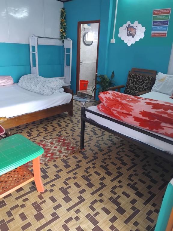 Postel nebo postele na pokoji v ubytování Kalimpong View Homestay