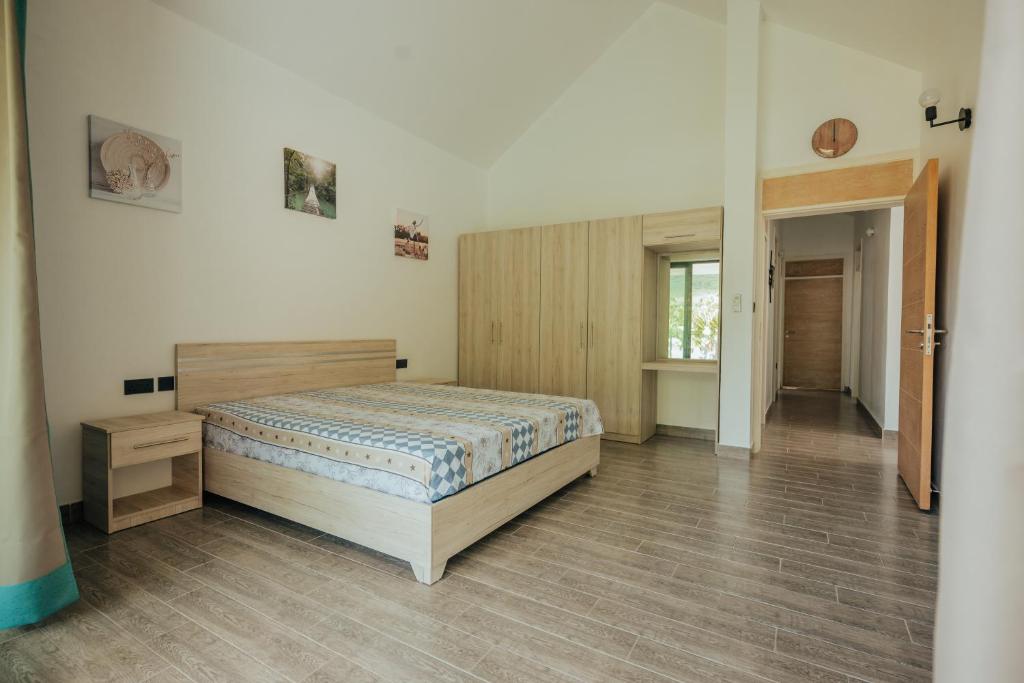 Кровать или кровати в номере Two Villas