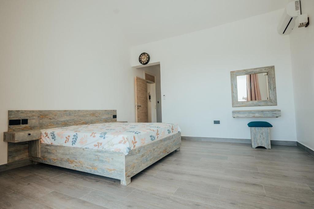 Кровать или кровати в номере Two Villas