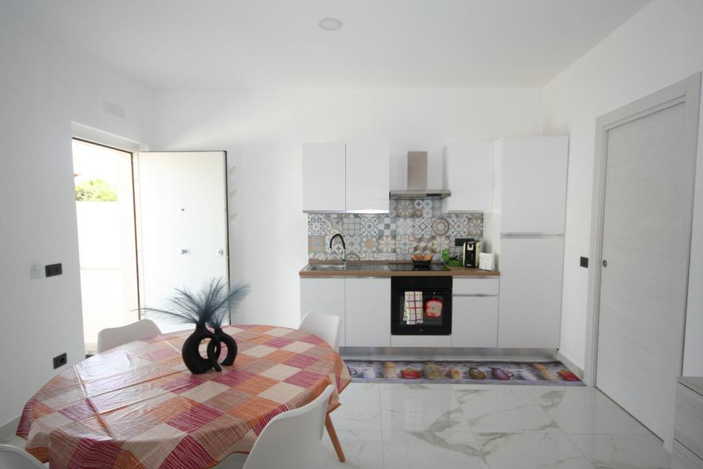 Kuchyň nebo kuchyňský kout v ubytování B&B LuxHome