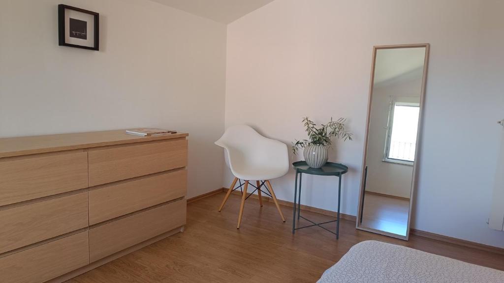Postel nebo postele na pokoji v ubytování Villa Ulivo Apartments