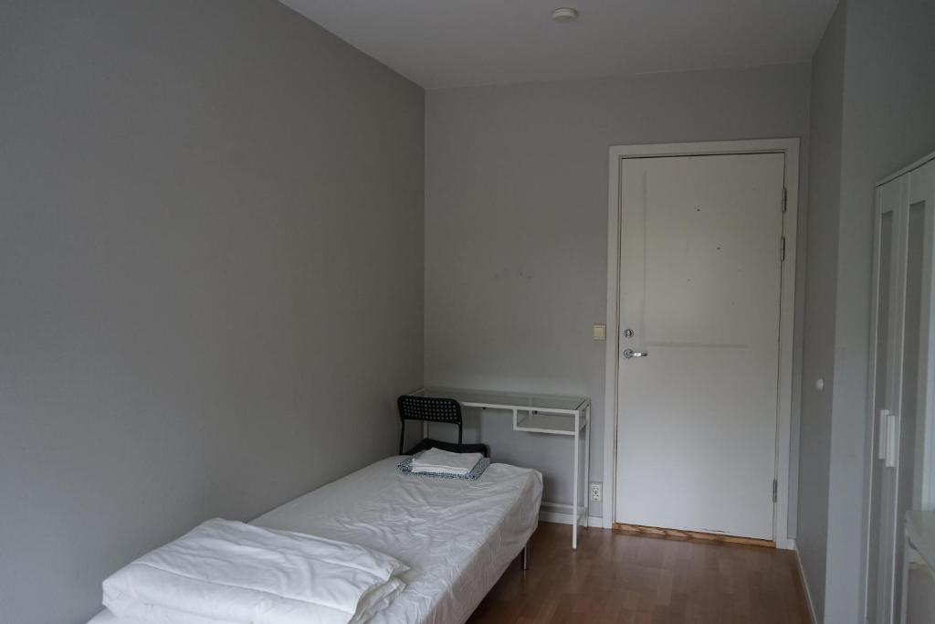 Postel nebo postele na pokoji v ubytování Home Express Oslo