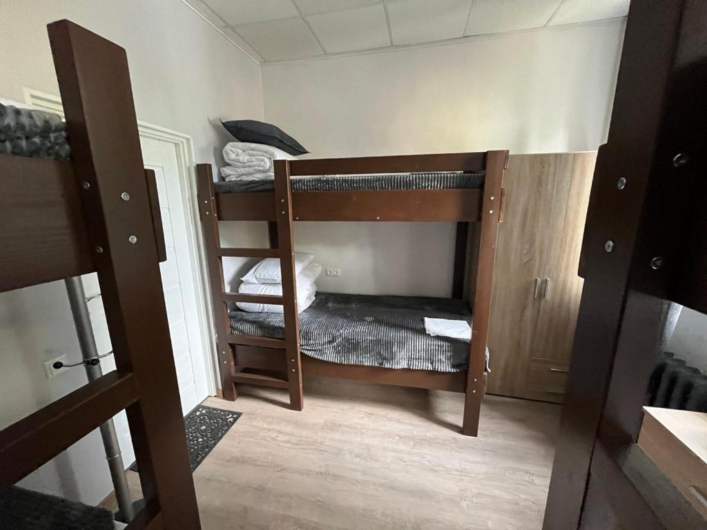 Voodi või voodid majutusasutuse Santel Apart Hostel toas