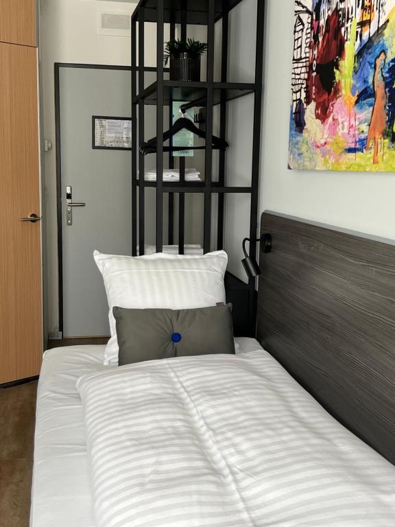 Postel nebo postele na pokoji v ubytování Cabinn Plus Esbjerg