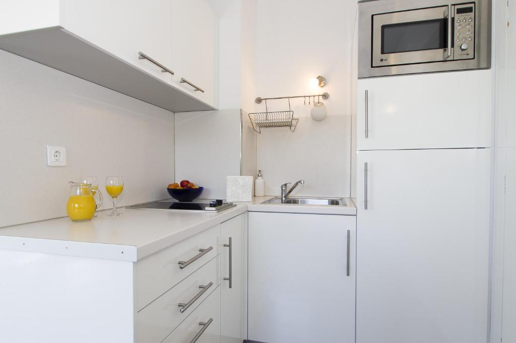 Cuisine ou kitchenette dans l'établissement Apartments Villa Olea