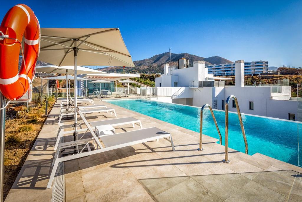 Bazén v ubytování ViVi Homes - Sunny Views Wellness, Gym, Pool & Sea view nebo v jeho okolí