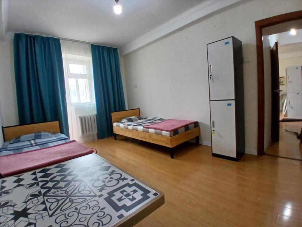Postel nebo postele na pokoji v ubytování Lana Hostel