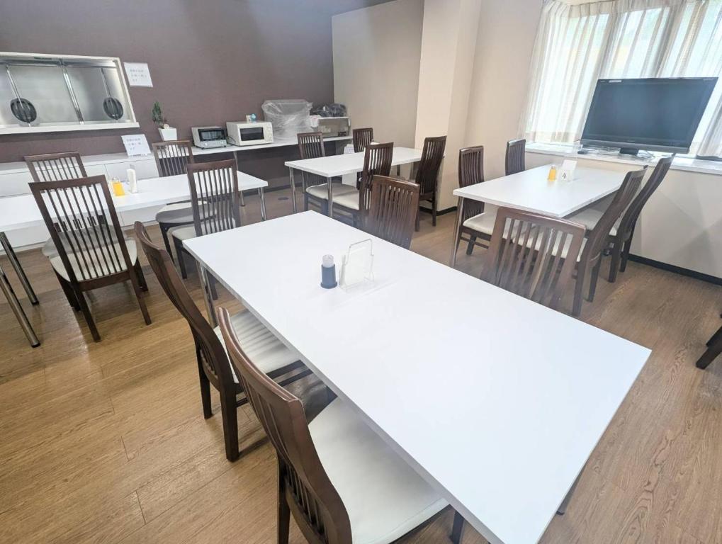 Kuchyň nebo kuchyňský kout v ubytování HOTEL COLLECT