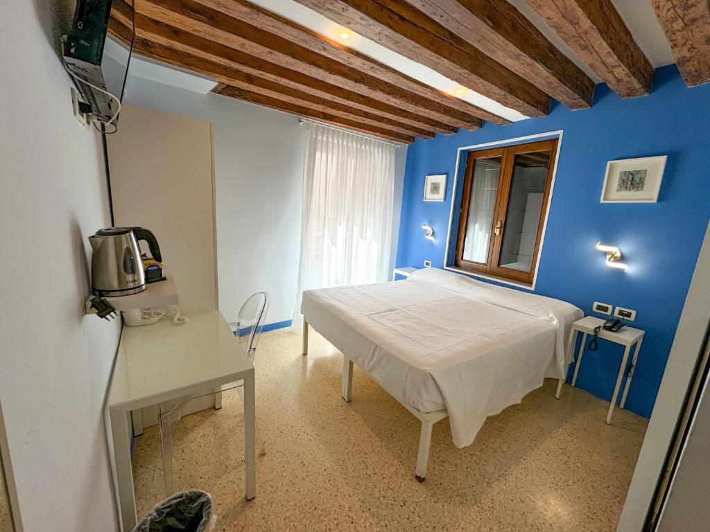 TV a/nebo společenská místnost v ubytování Hotel Adriatico