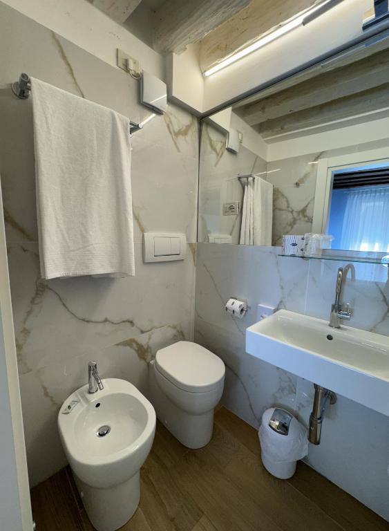 Koupelna v ubytování Hotel Adriatico
