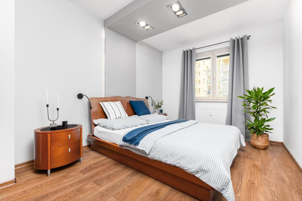 Katil atau katil-katil dalam bilik di Apartament Mokotów -basen-