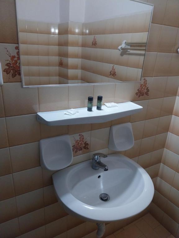 Koupelna v ubytování Hotel Liliana