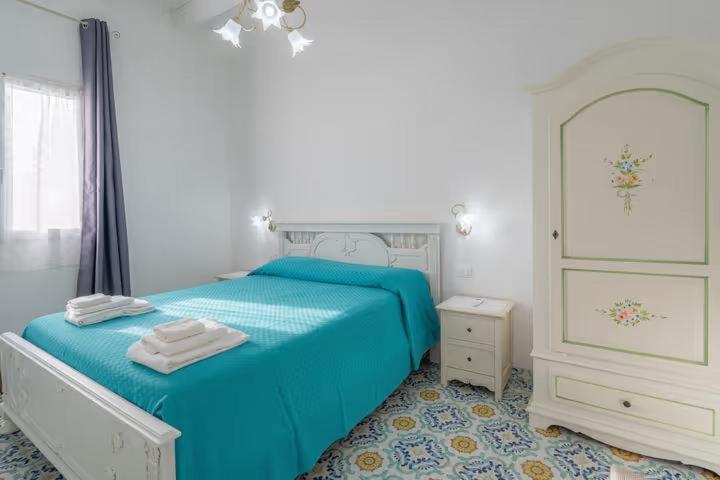 Postel nebo postele na pokoji v ubytování Agri Lemon Green Case vacanze