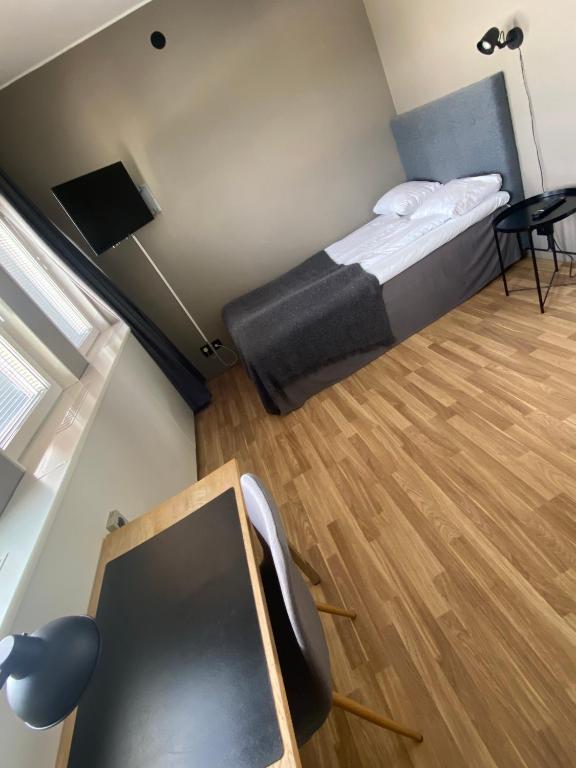 Postel nebo postele na pokoji v ubytování Hotell City