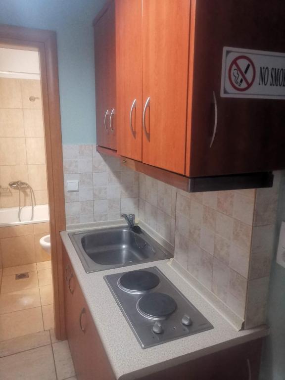 Kuchyň nebo kuchyňský kout v ubytování Julie Apartment