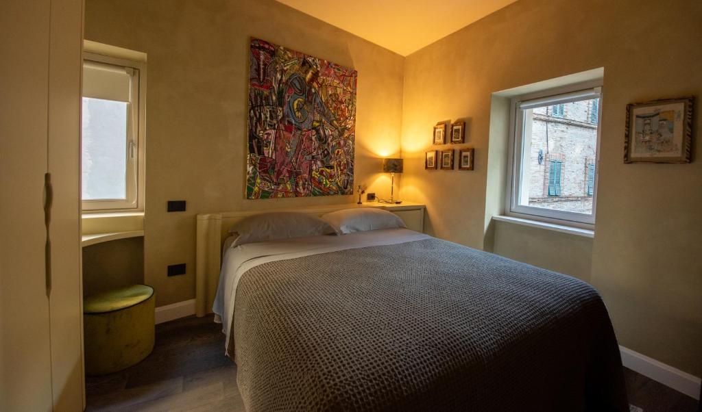 A bed or beds in a room at Casa Segreta