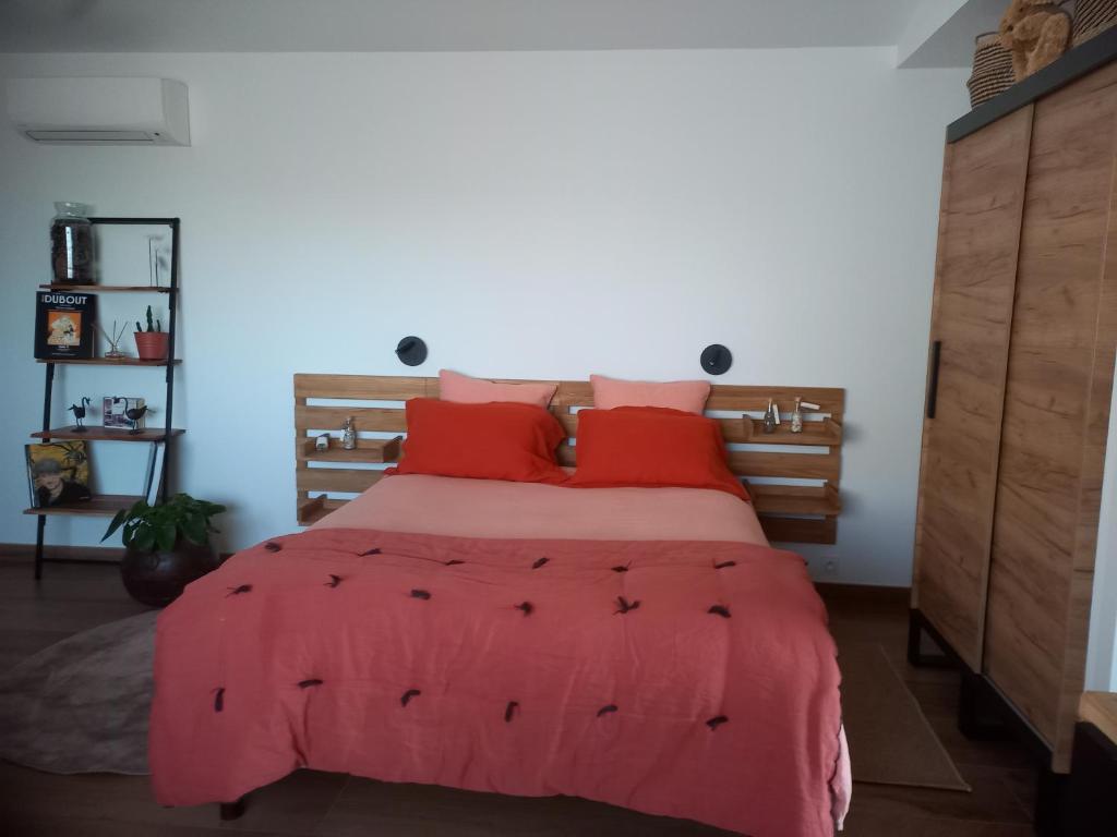 Posteľ alebo postele v izbe v ubytovaní La lagune aux oiseaux